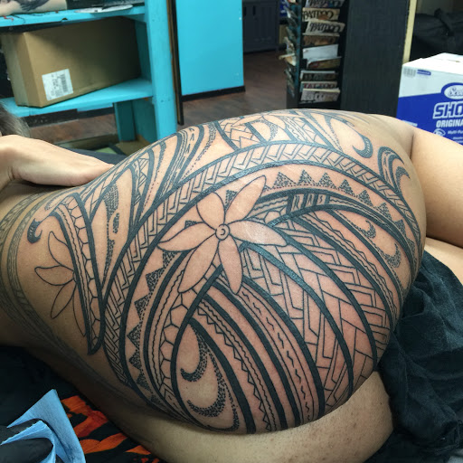 Explore american flag sleeve tattoo ideas, creative tattoo ideas in Hilo, available at Native Flesh Tattoo