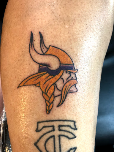 Explore small floral tattoo ideas, creative tattoo ideas in Saint Paul, available at Grand Avenue Tattoo