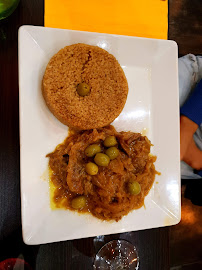 Poulet au curry du Restaurant de spécialités d'Afrique de l'Ouest Afrik'N'Fusion à Paris - n°4