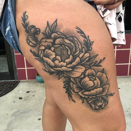 Explore leg tattoo cover up ideas, creative tattoo ideas in Jacksonville, available at Electric Legacy Tattoo