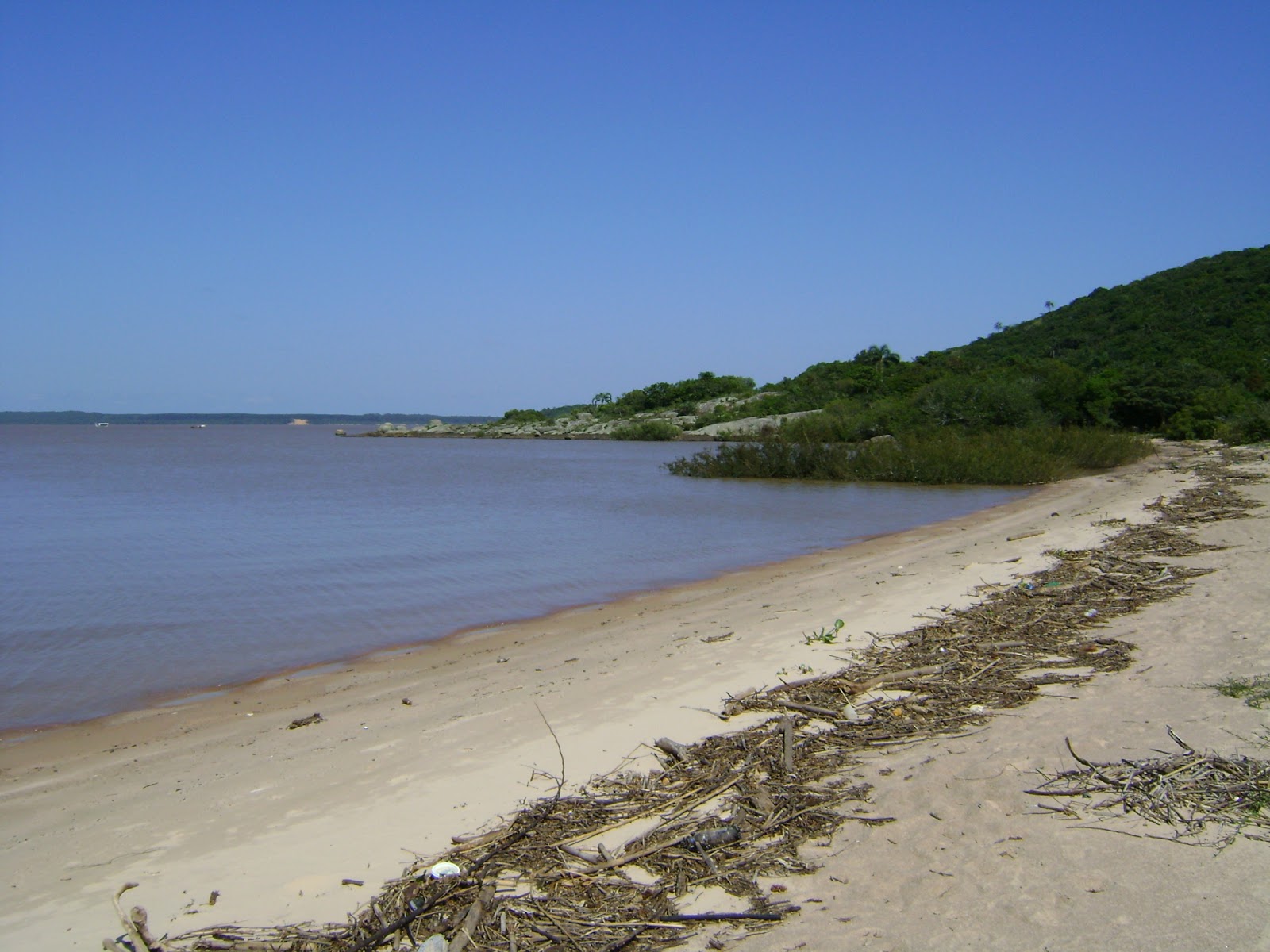 Fotografija Praia da Pedreira z svetel pesek površino