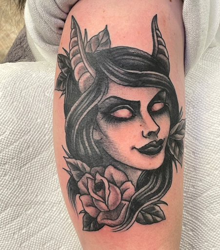 Explore front thigh tattoo ideas for women, creative tattoo ideas in Delmar, available at Resolute Tattoo
