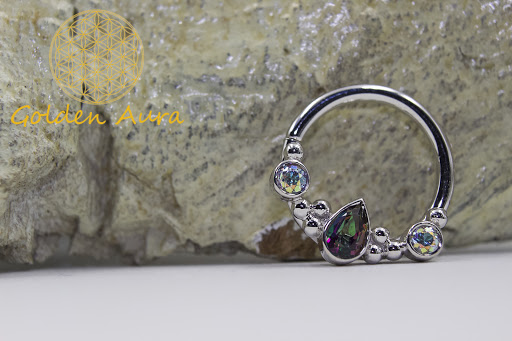 Find tattoo ideas under breast for your next unique tattoo in Marion at Golden Aura