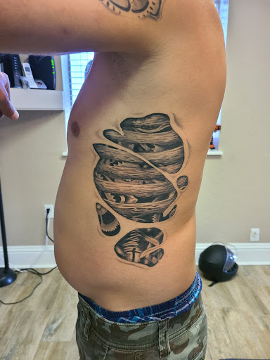 Explore mens wedding band tattoo ideas, creative tattoo ideas in Auburndale, available at Till Death Tattoo Studio