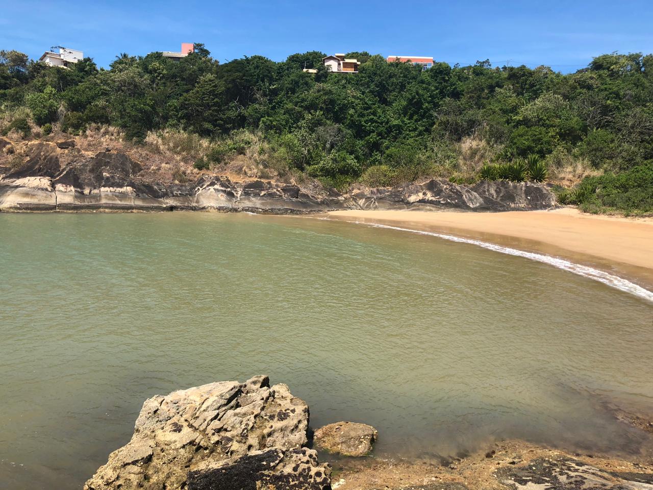 Foto von Sape Strand mit kleine bucht