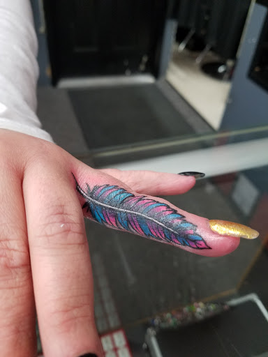 Explore cover up tattoo ideas for names on wrist, creative tattoo ideas in Buffalo, available at Wishful Inking Tattoos & Piercings