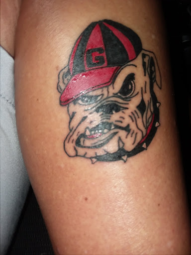 Find western cowboy tattoo ideas for your next unique tattoo in Hendersonville at Draw The Line Tattoo Club