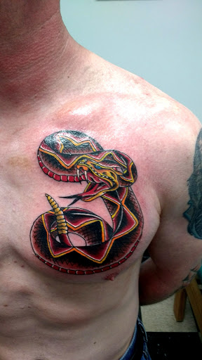 Explore black and gray tattoo ideas, creative tattoo ideas in New Bern, available at Ol Skool Tattoos