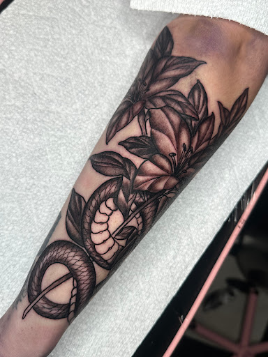 Explore tramp stamp tattoo cover up ideas, creative tattoo ideas in Naugatuck, available at Tooth And Nail Tattoo