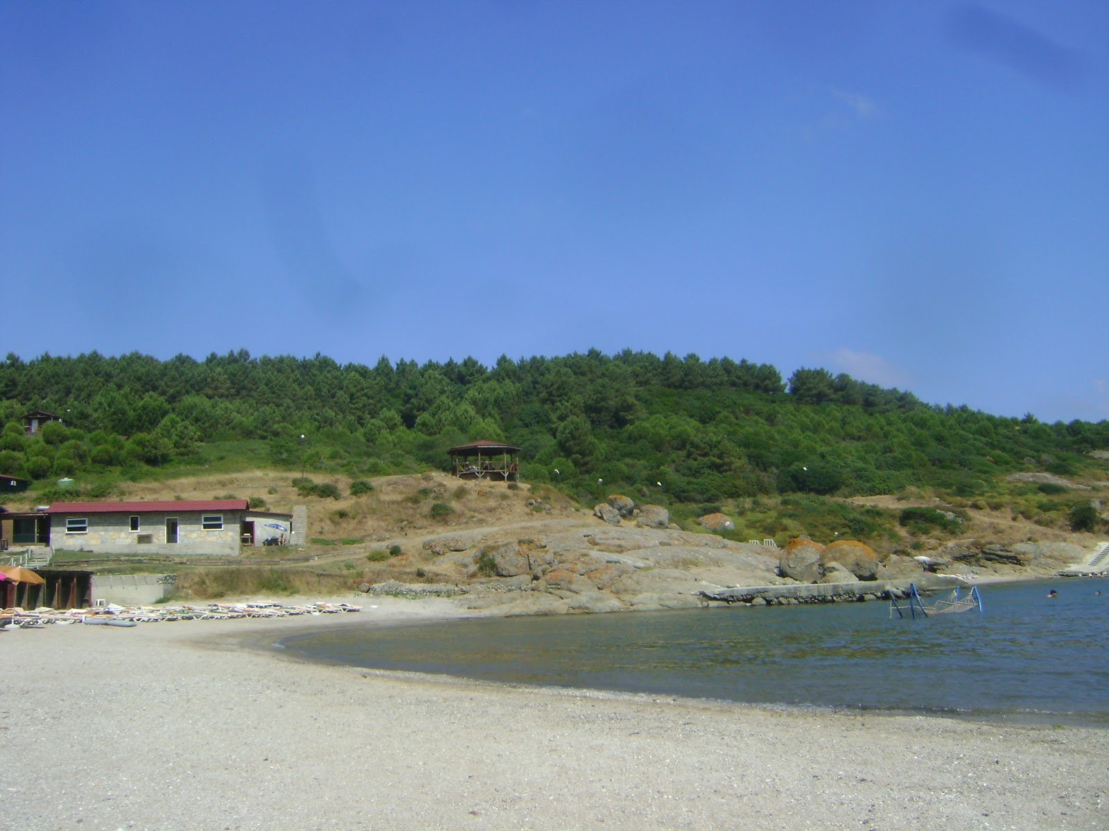 Φωτογραφία του Sebastian beach II με ψιλά βότσαλα επιφάνεια