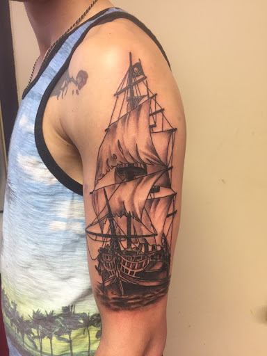 Tattoo Shop «Skinny Buddha Tattoo», reviews and photos, 203 S Monroe Ave, Green Bay, WI 54301, USA