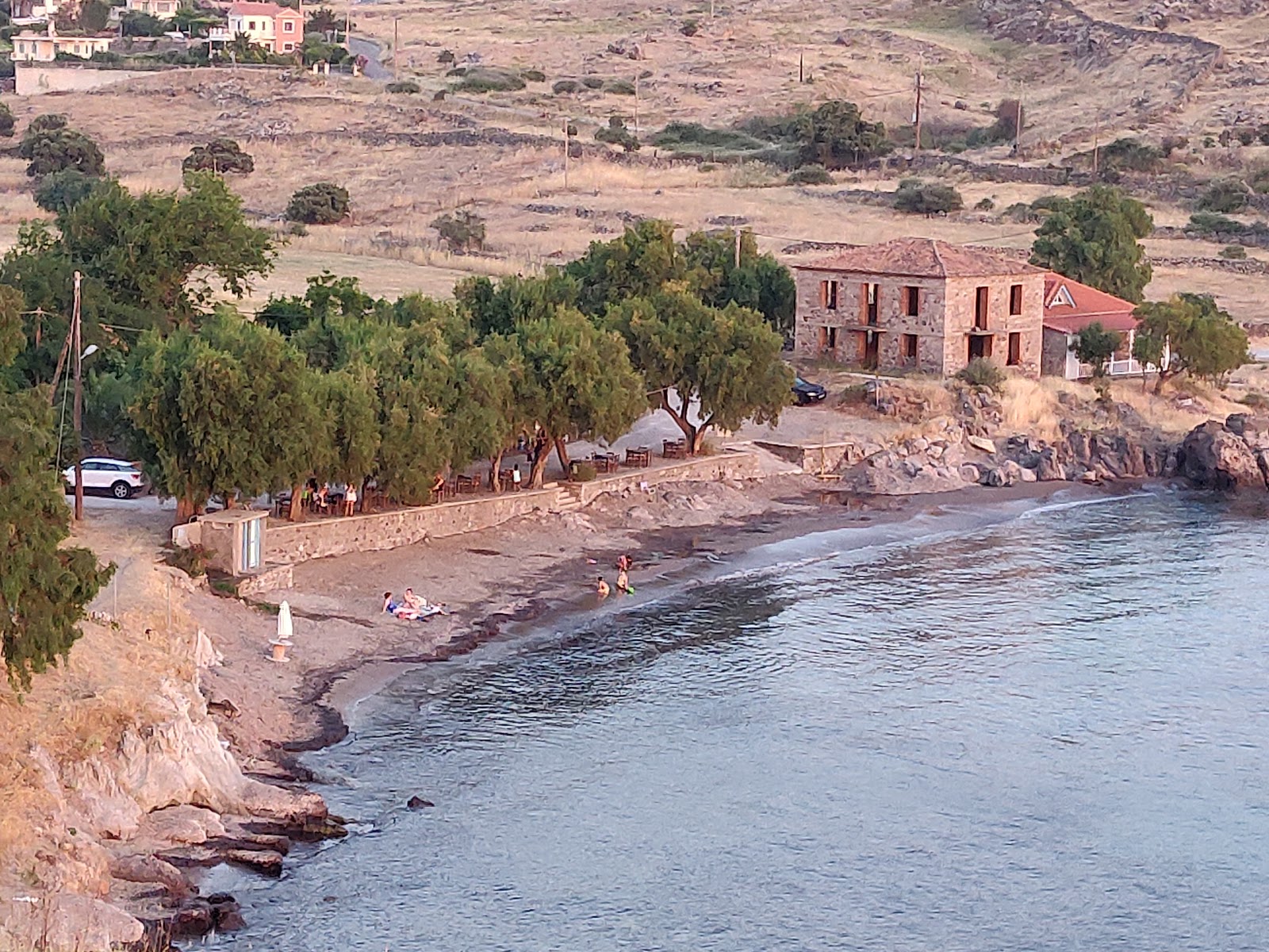 Photo of Good Harbor beach backed by cliffs