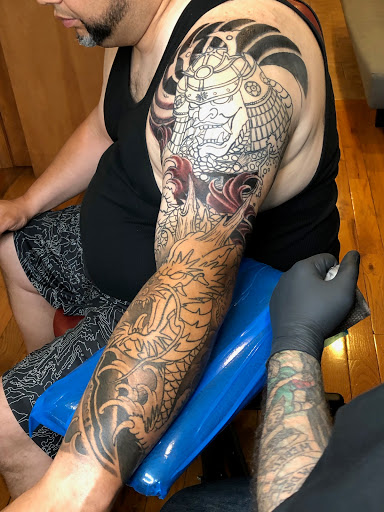 Explore name face tattoo ideas, creative tattoo ideas in Brooklyn, available at Hand of Glory Tattoo & Piercing