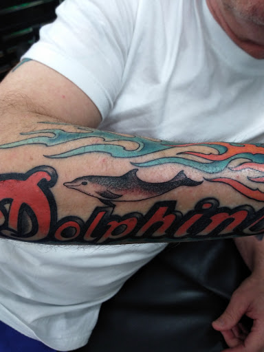 Explore thin blue line tattoo ideas, creative tattoo ideas in Huntington Station, available at Station 1 Tattoo