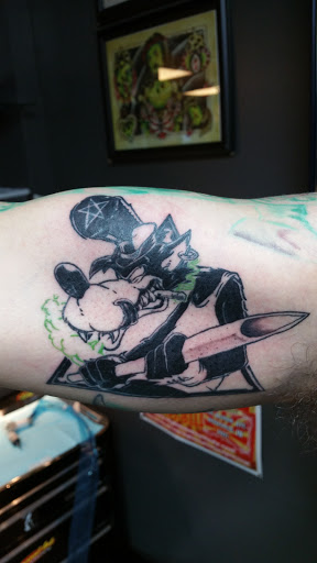 Find mom tattoo ideas for your next unique tattoo in Foley at Black Sheep Custom Tattoos and Piercings