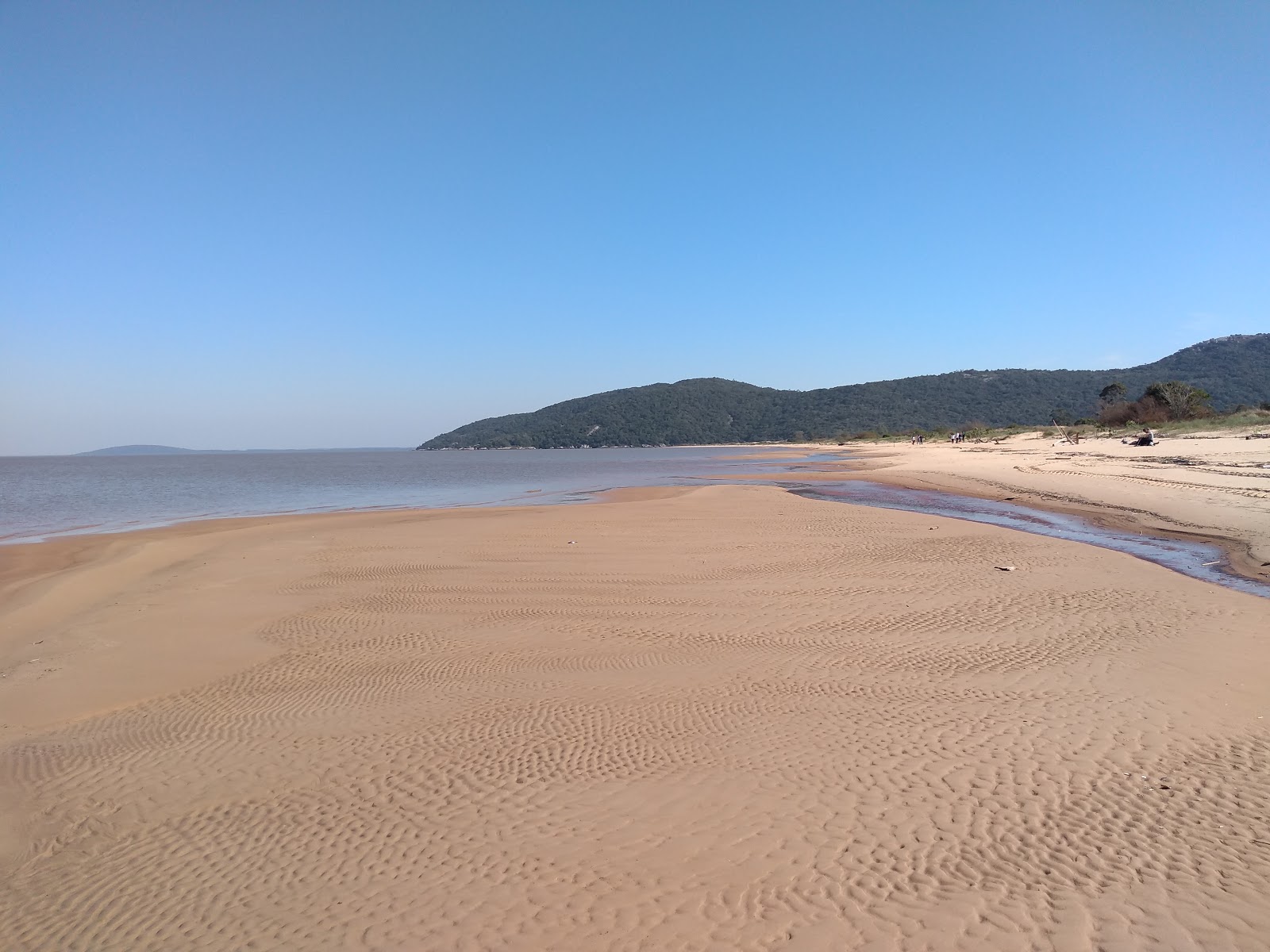 Foto van Praia de Fora met helder zand oppervlakte