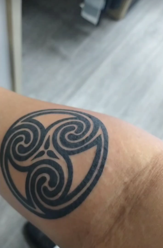 Explore wrestling tattoo ideas, creative tattoo ideas in Manteca, available at Union Tattoo & Piercing