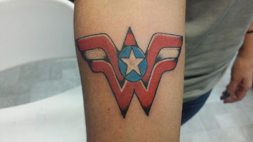 Explore small tattoo ideas for guys, creative tattoo ideas in Groves, available at Billet Tattoo Studio