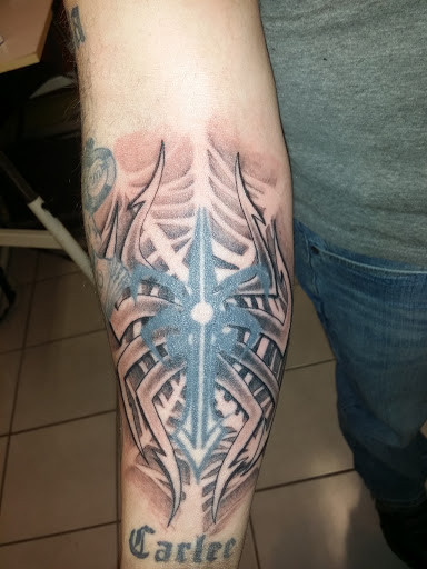 Explore colorful flower tattoo ideas, creative tattoo ideas in Foley, available at Black Sheep Custom Tattoos and Piercings