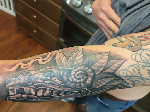 Explore shell tattoo ideas, creative tattoo ideas in Perris, available at Downtown Tattoos Perris