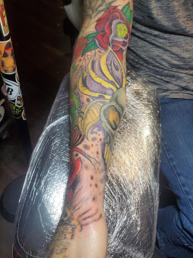 Explore male side tattoo ideas, creative tattoo ideas in Houston, available at Sintown Tattoo Studio