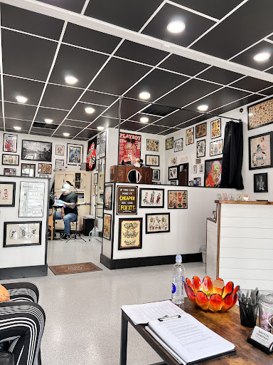 Explore thigh cover up tattoo ideas, creative tattoo ideas in Youngsville, available at Bad Fun Company