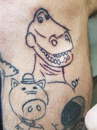Explore tattoo ideas for a dad, creative tattoo ideas in Johnstown, available at Screaming Needle Tattoo & Body Piercing