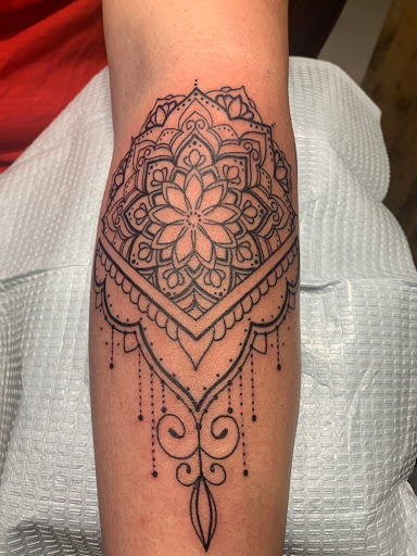 Explore outdoor tattoo ideas for men, creative tattoo ideas in Cape Coral, available at UNRIVALED INK