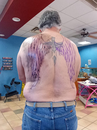 Explore face tattoo ideas for men, creative tattoo ideas in Cabot, available at ELECTRIC PANTHER TATTOO GALLERY