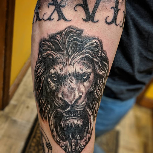 Explore lily flower tattoo ideas, creative tattoo ideas in Meriden, available at Time and Tide