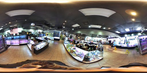 Tattoo Shop «Dungeon Body Piercing & Tattoos», reviews and photos, 10014 University Blvd, Orlando, FL 32817, USA