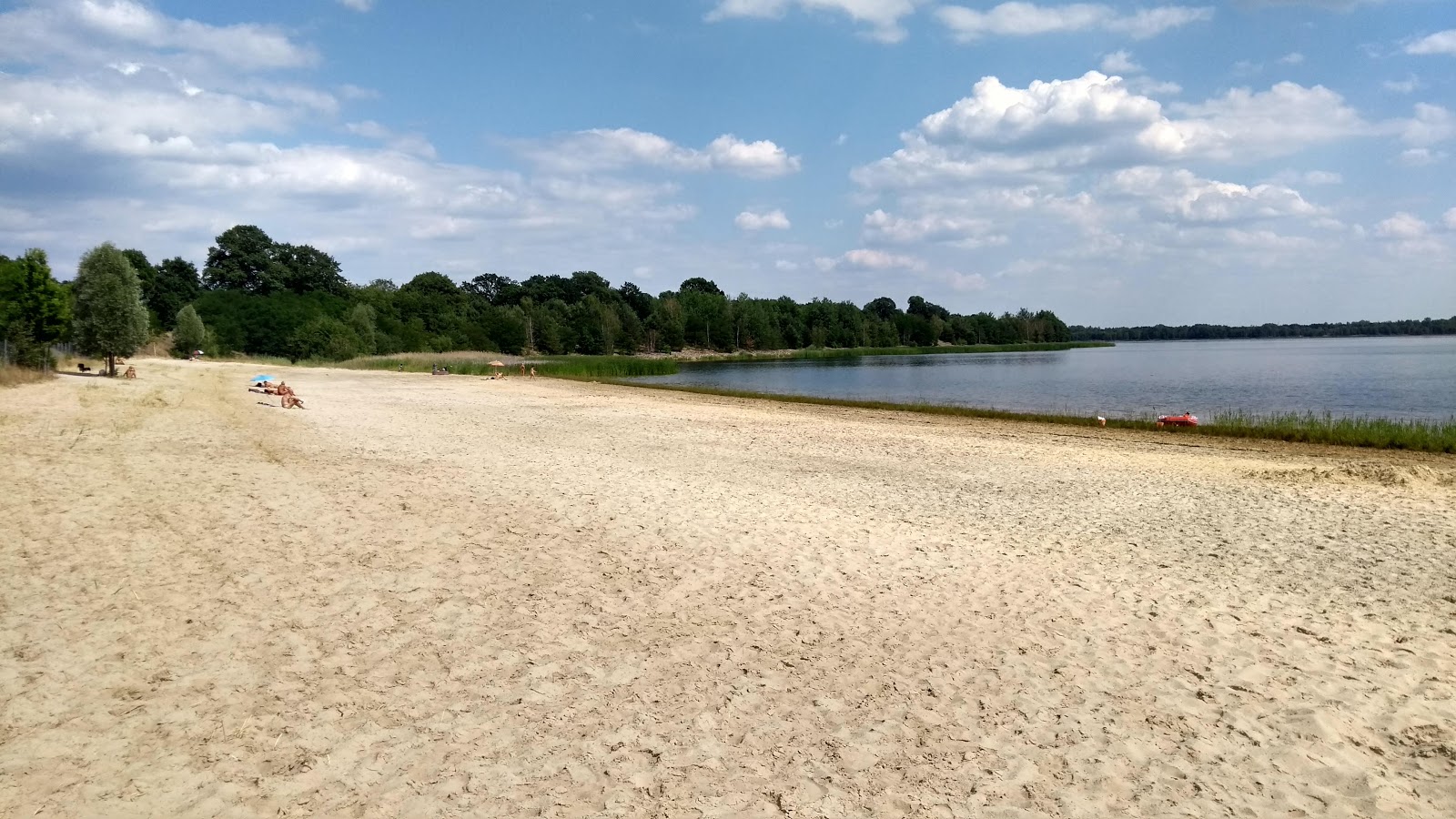Foto di Lohsa Beach con una superficie del sabbia beige