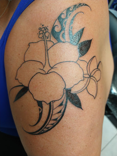 Explore trout tattoo ideas, creative tattoo ideas in Honolulu, available at Sacred Art Tattoo Waikiki