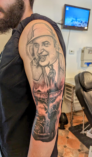 Explore moonshine tattoo ideas, creative tattoo ideas in Hebron, available at Explosive Ink Tattoo