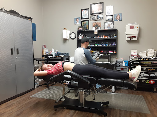 Explore chest and sleeve tattoo ideas, creative tattoo ideas in Alliance, available at Bad Boy Tattoo & Body Piercing