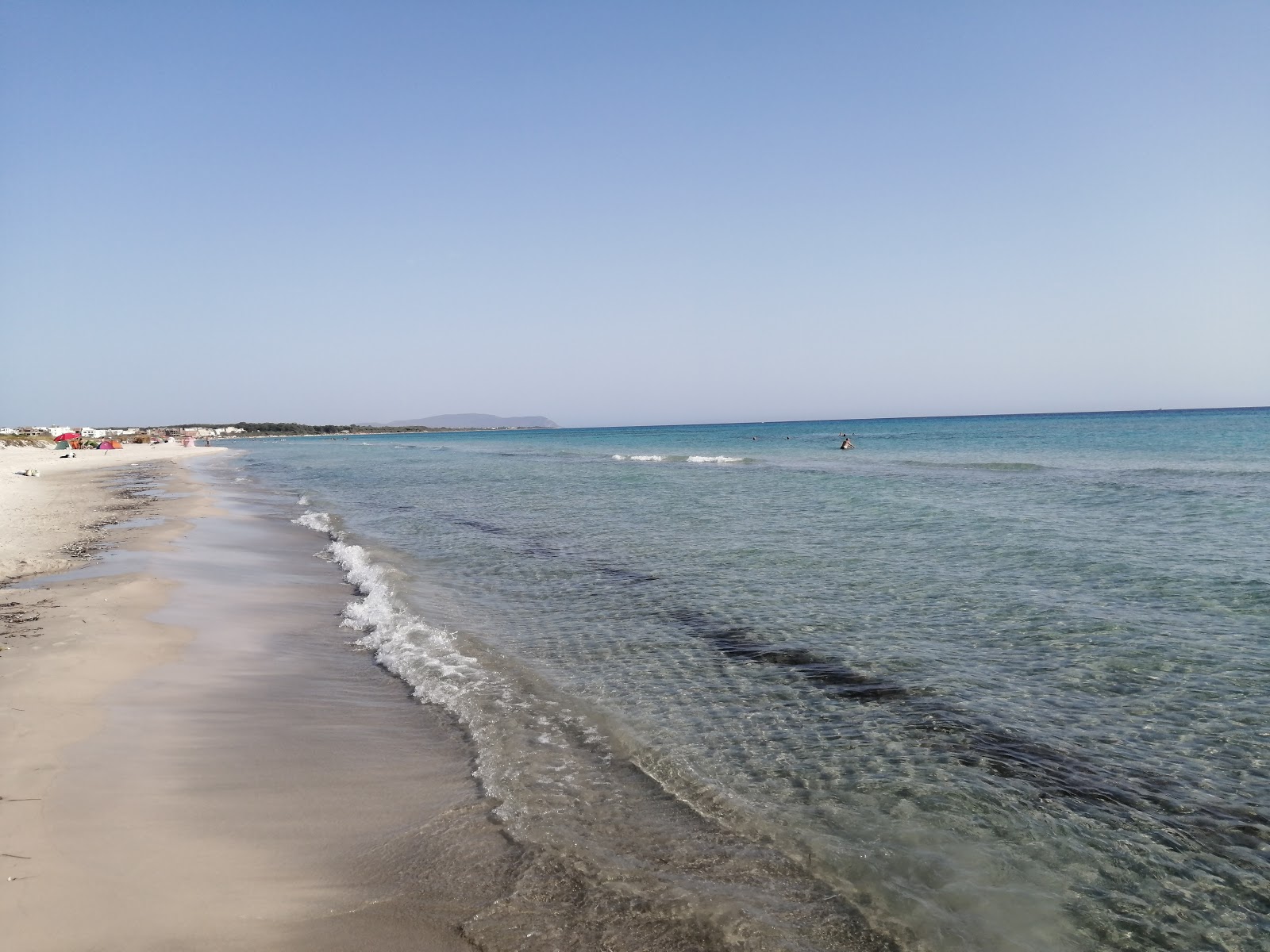 Fotografija Hammam El Ghezaz z svetel pesek površino