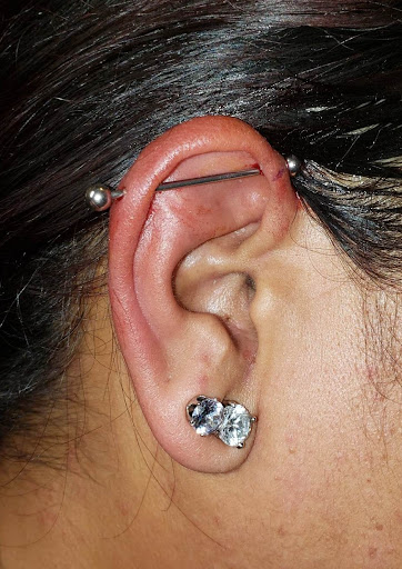 Explore neck tattoo ideas small, creative tattoo ideas in Pahoa, available at Electric Jungle Tattoo