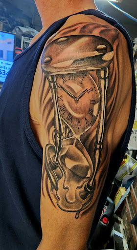 Explore rock and roll tattoo ideas, creative tattoo ideas in Omaha, available at Big Brain