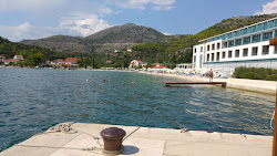 Slano Beach'in fotoğrafı geniş bir kıyı şeridi ile birlikte