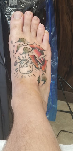 Explore chest and neck tattoo ideas, creative tattoo ideas in Riverside, available at Elizabeth St. Tattoo