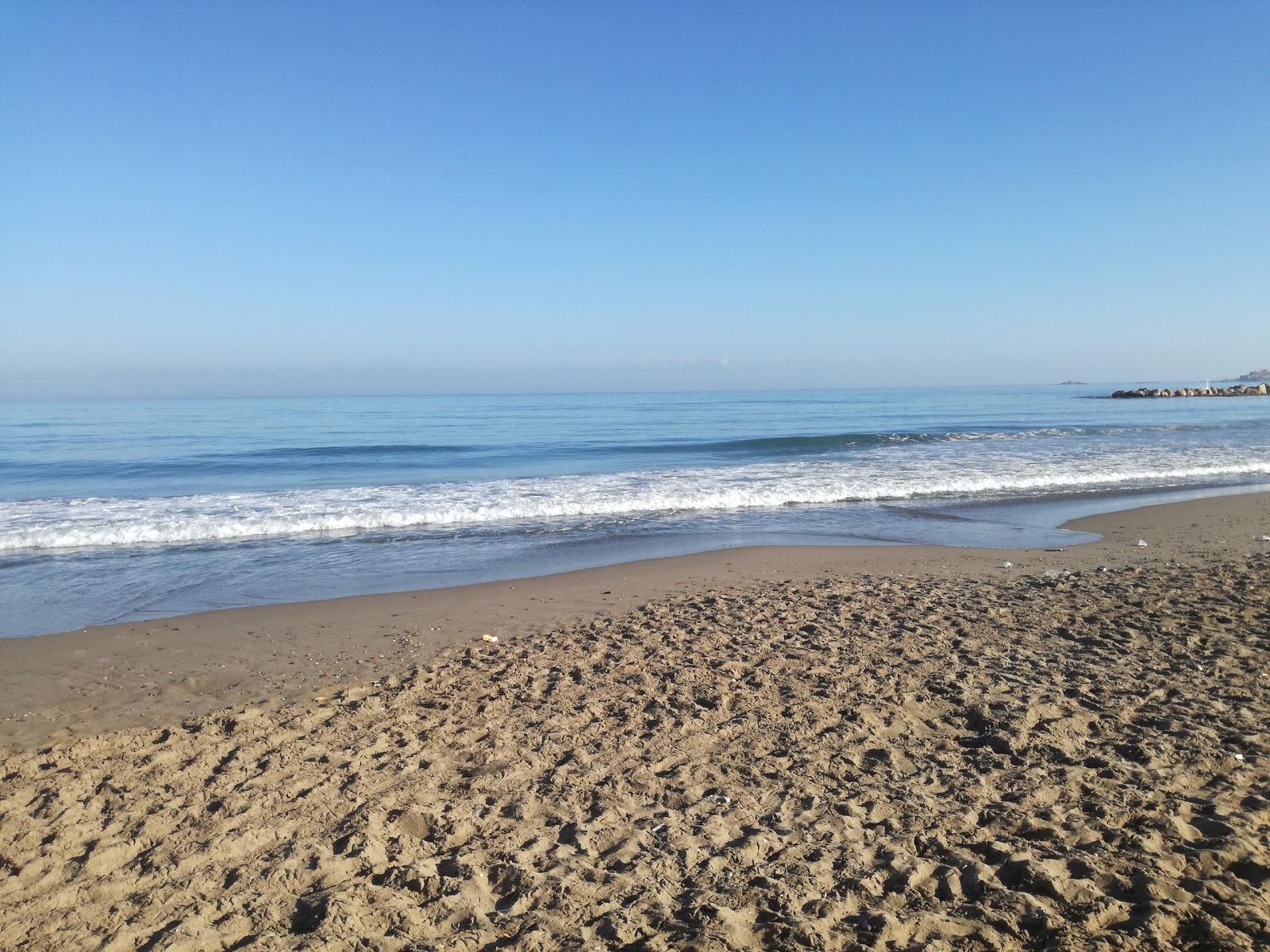 Foto van Sables D'or beach en de nederzetting