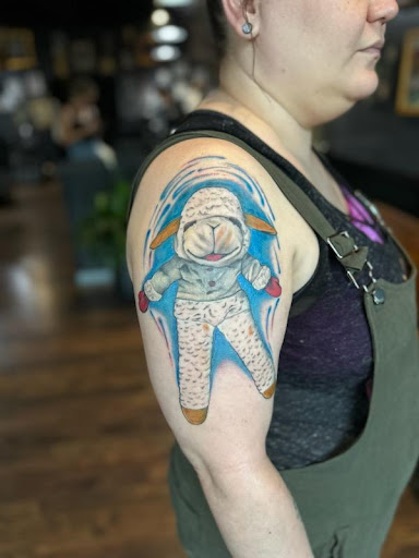 Explore tattoo ideas chest and arm, creative tattoo ideas in Powell, available at Riot Ink