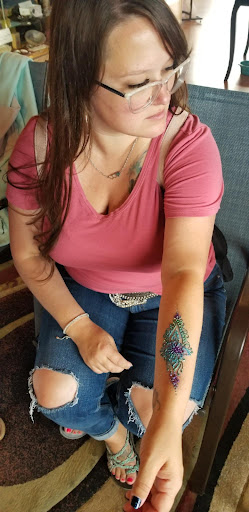 Explore small behind ear tattoo ideas, creative tattoo ideas in Seaside, available at Five Star Henna