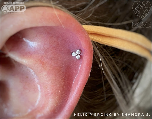 Explore hand mens tattoo ideas, creative tattoo ideas in Spokane, available at Moms Custom Tattoo & Body Piercing