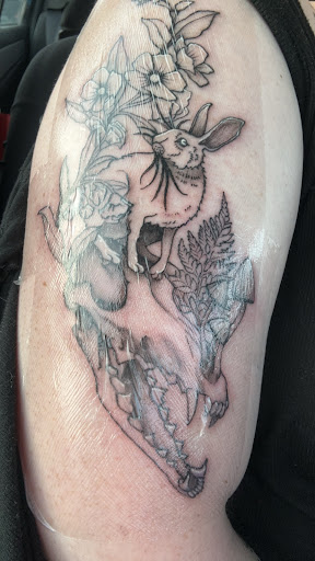 Explore religious tattoo ideas for women, creative tattoo ideas in Norway, available at Norway Lakes White Raven Tattoo