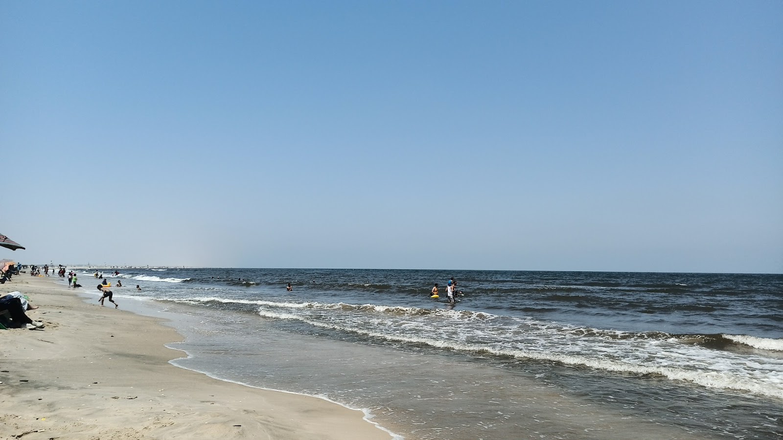 Foto de Gamasa Beach II com areia brilhante superfície