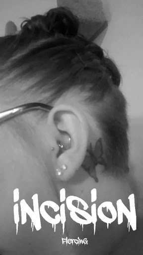 Explore dog tag tattoo ideas, creative tattoo ideas in Ogden, available at LuXx Piercing iNcisioN Piercing