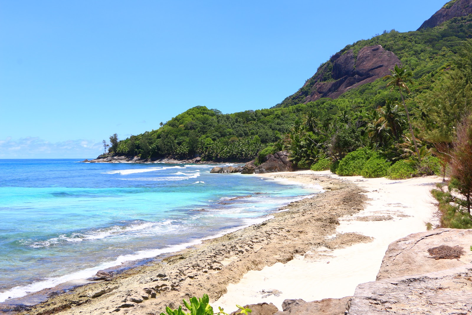 Photo of Anse Lascars with bright sand surface