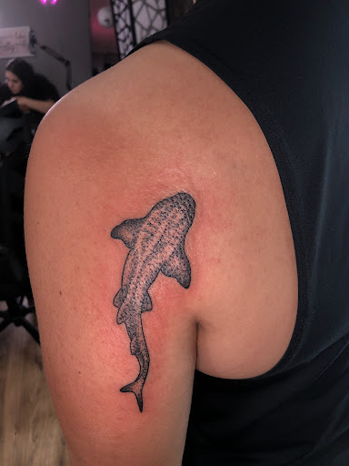 Explore tattoo ideas for a name cover up, creative tattoo ideas in North Tonawanda, available at Dark Side Ink Tattoo Studio