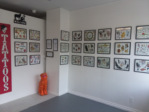 Explore vintage halloween tattoo ideas, creative tattoo ideas in Salem, available at Outwest Tattoo and body piercing ,30 years of tattooing,only life time guarantee